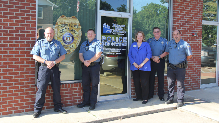 Police Officers and Chancellor Lawler Outside the new Substation