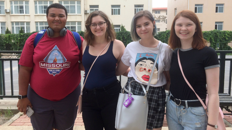 Four students studying at the China Campus