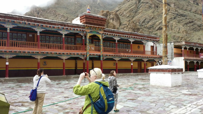 Students taking pictures outside the Hemis Monastery