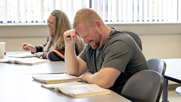 two students enjoying class