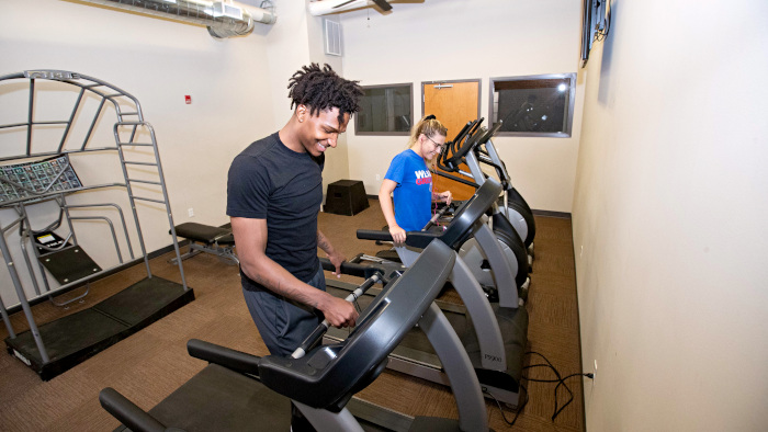 Students in the Grizzly Loft's exercise room