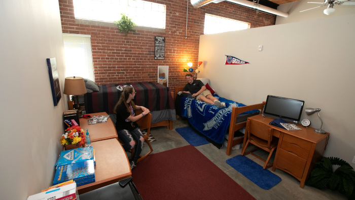 Students visiting in a Grizzly Lofts room