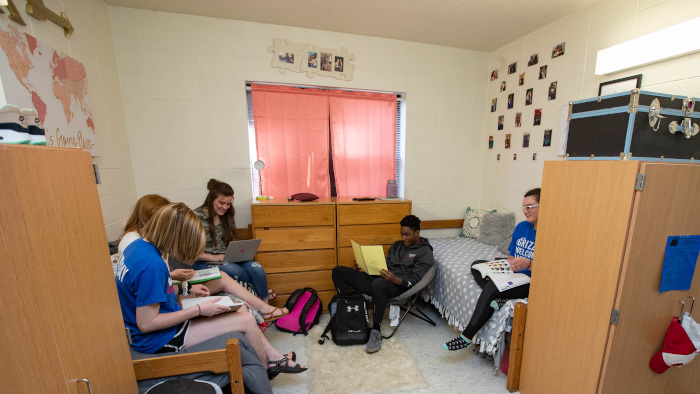 Students visiting in a Grizzly House room