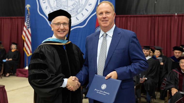 Honorary Degree recipient with the Chancellor at Commencement