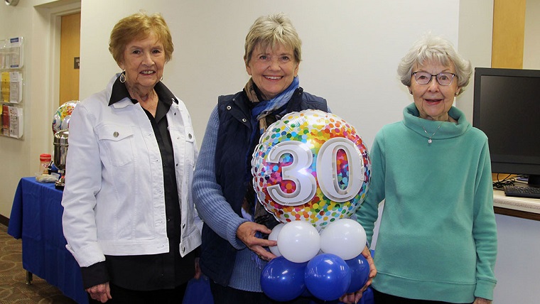 Three Friends of the Garnett Library members at the 30th anniversary celebration
