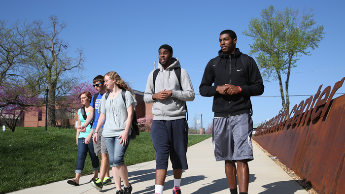 Students walking in front of the Student Recreation Center.