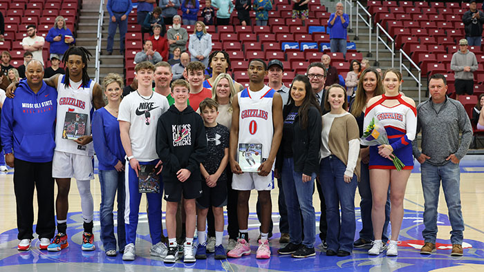 Basketball Players with awards and host families 