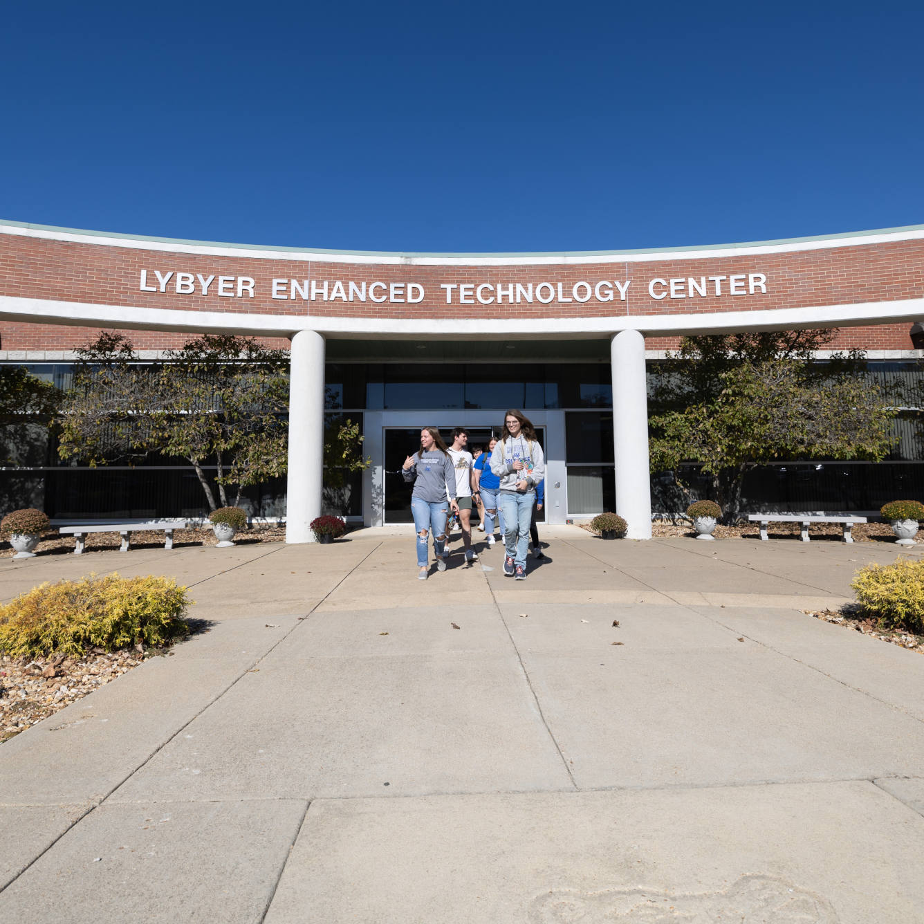 Students walk outside at Lybyer Technology Center