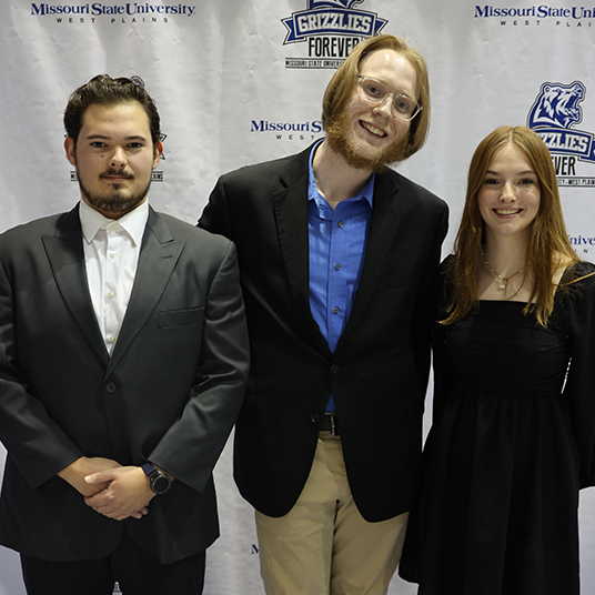 The 2025-2026 Student Government Association (SGA) president and vice president at Missouri State University-West Plains (MSU-WP) were sworn in during the annual Celebration of Leaders student awards ceremony. They are President Max Bittle, left, Houston, and Vice President Michell Robles, right, West Plains. Congratulating them above is 2024-2025 SGA President Mo Totty, West Plains. 