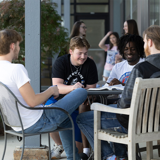 Students in a common area at the Grizzly Lofts