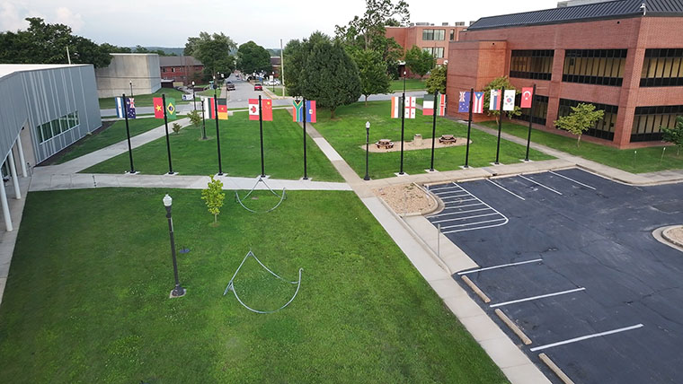 Flags between Hass-Darr and Melton Halls